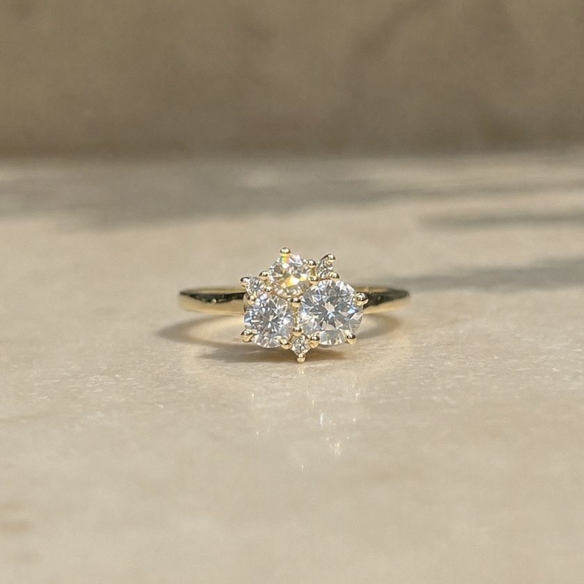After — one cluster ring holding every stone