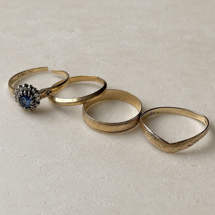 Before — four unworn gold rings
